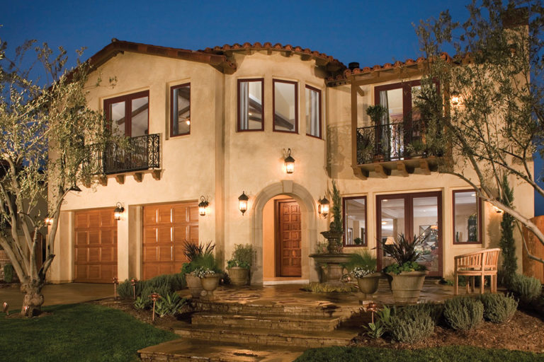 Mediterranean-style home exterior with coordinated windows and doors