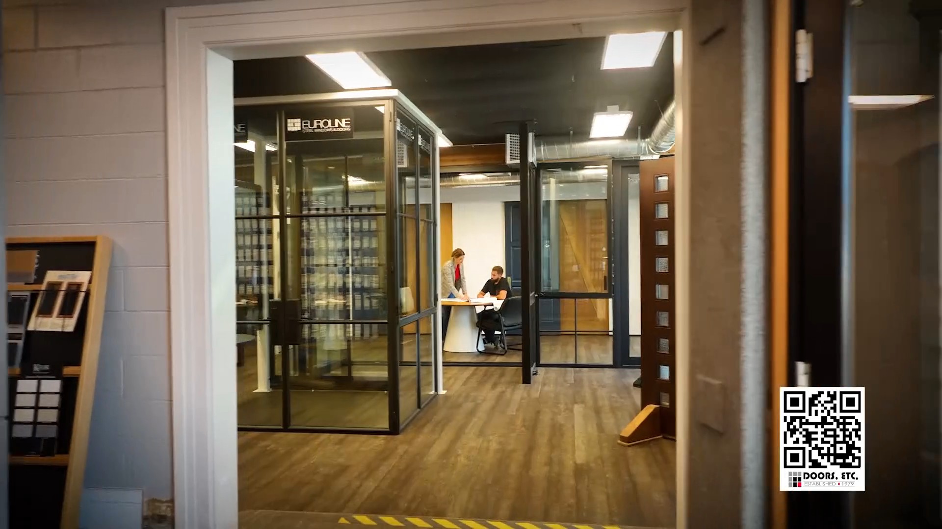 Doors Etc showroom with full-size door and window displays